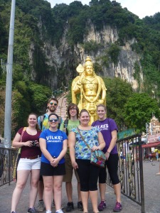Nearing the steps to the cave, the student teachers pose before one of the most famous Malaysian landmark, the statue of Lord Murugan.